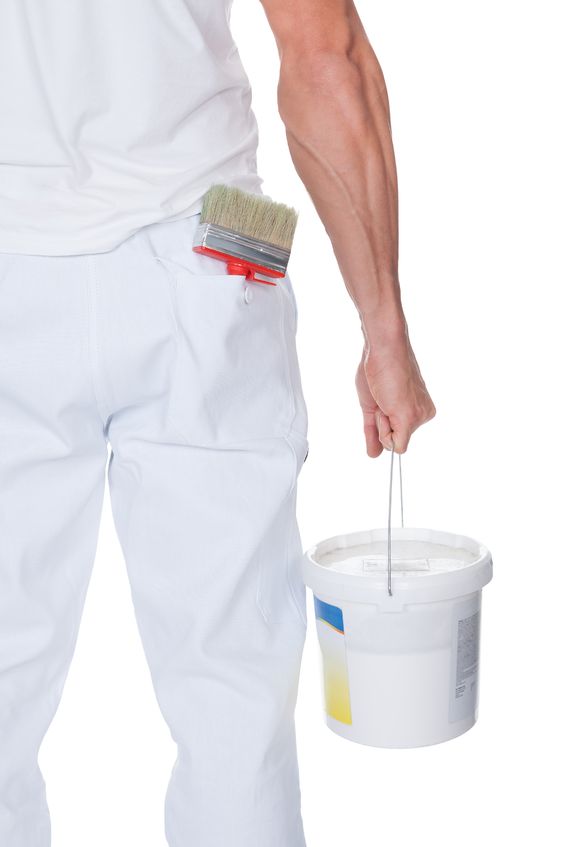 painter holding a paint bucket